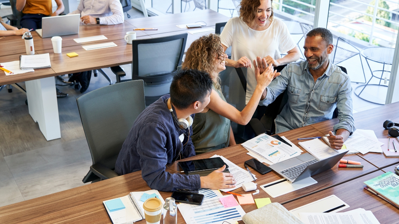 a close-up of people shaking hands